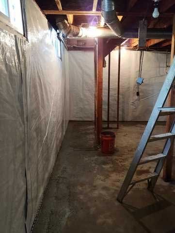 After photo of a waterproofed basement wall.