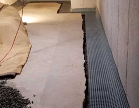 Effective Basement Flooding Prevention with French Drain Installation.