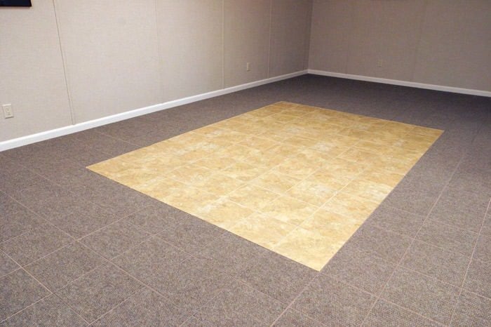 Carpeted-tiled basement flooring installed for a stylish and functional basement area in a home in Coeur d'Alene and 3rd Street