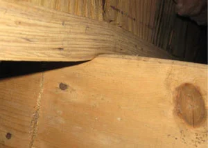 Failing floor joists in Cocolalla, ID showing signs of damage