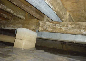 Poor crawl space supports in Cheney, WA showing inadequate support