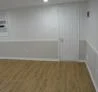 Restored basement wall showcasing improved structural integrity and finish in a home in Sandpoint near 1st Avenue