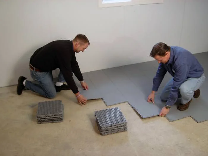 Sub-floor tiles installed in a basement