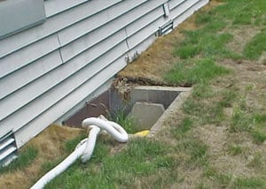 Old and damaged crawl space access well in need of replacement