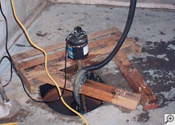 Old, unattractive pedestal pump in a basement setting