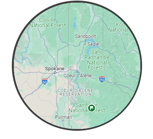 Map showing the service area of Premier Basement Systems, covering locations in Idaho and Washington including Coeur d'Alene, Spokane, Hayden, Sandpoint, Sagle, Post Falls, Spokane Valley, Dover, Ponderay, Priest Lake, Spirit Lake, Athol, Hauser, Bayview, Worley, Newman Lake, Green Bluff, Liberty Lake, Mead, Otis Orchards, Colbert, Blanchard, and Newport.