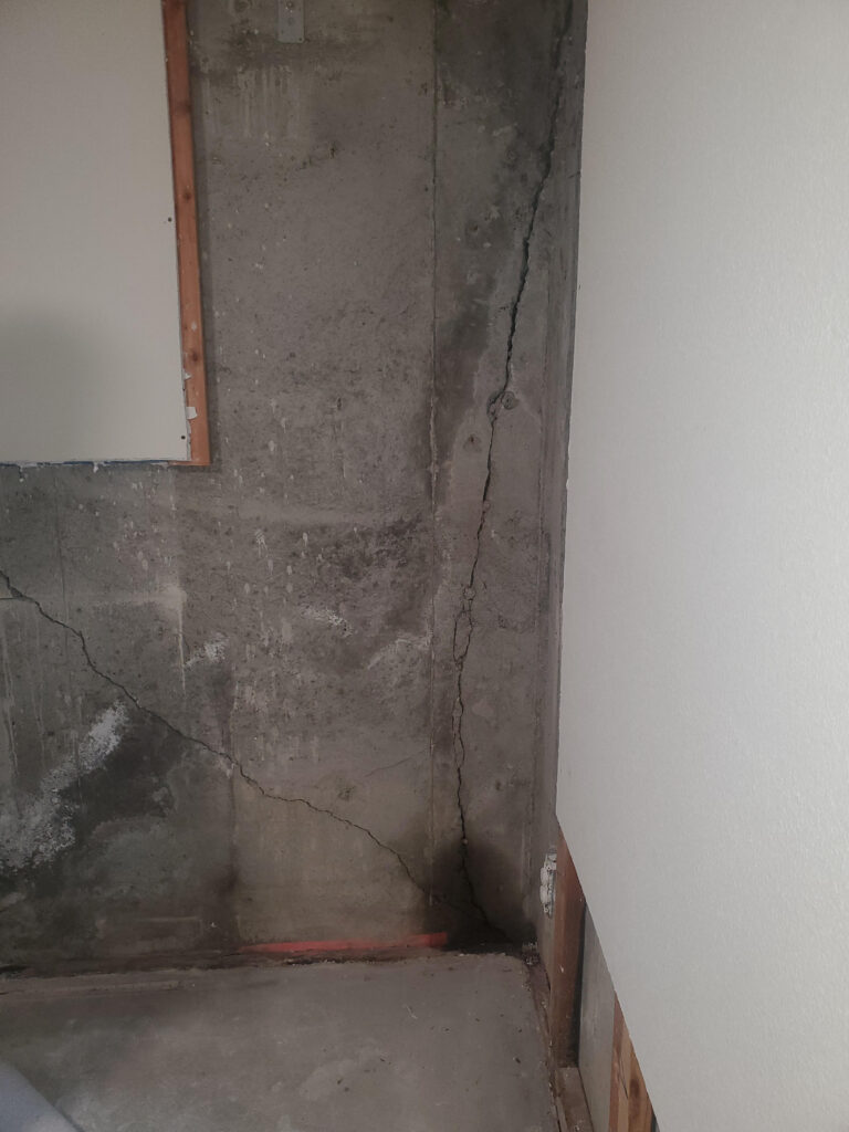 Cracks in a Spokane basement wall needing waterproofing